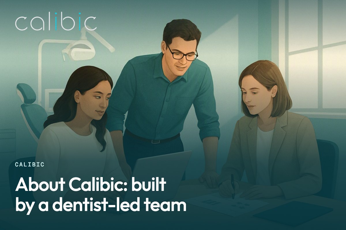 A small team at a worktable inside a dental practice, candid